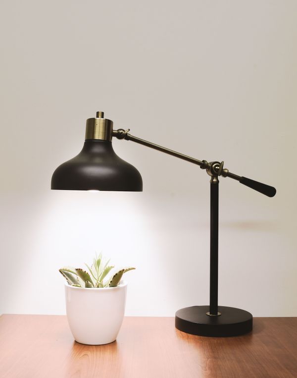 An LED desk lamp on a desk